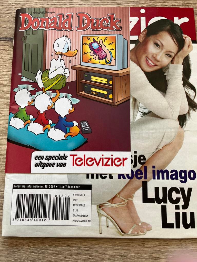 Donald Duck & Televizier - Lucy Liu (2007), Ophalen of Verzenden, Zo goed als nieuw