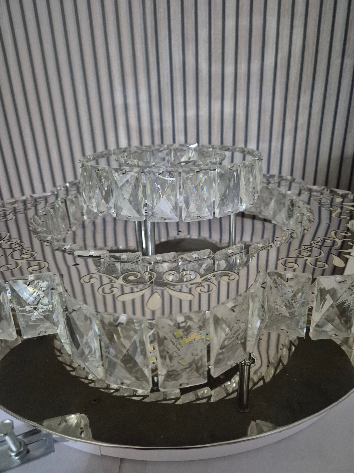 zilveren chandelier, Ophalen