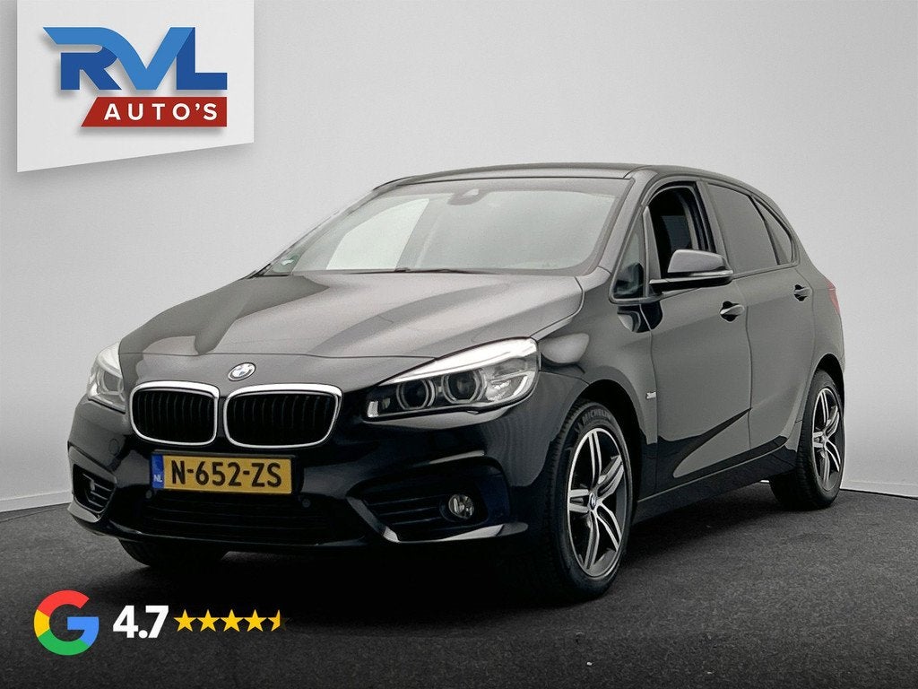 BMW 2-serie Active Tourer 218i Centennial High Executive | N, Auto's, BMW, 1345 kg, Gebruikt, Lichtsensor, Zwart