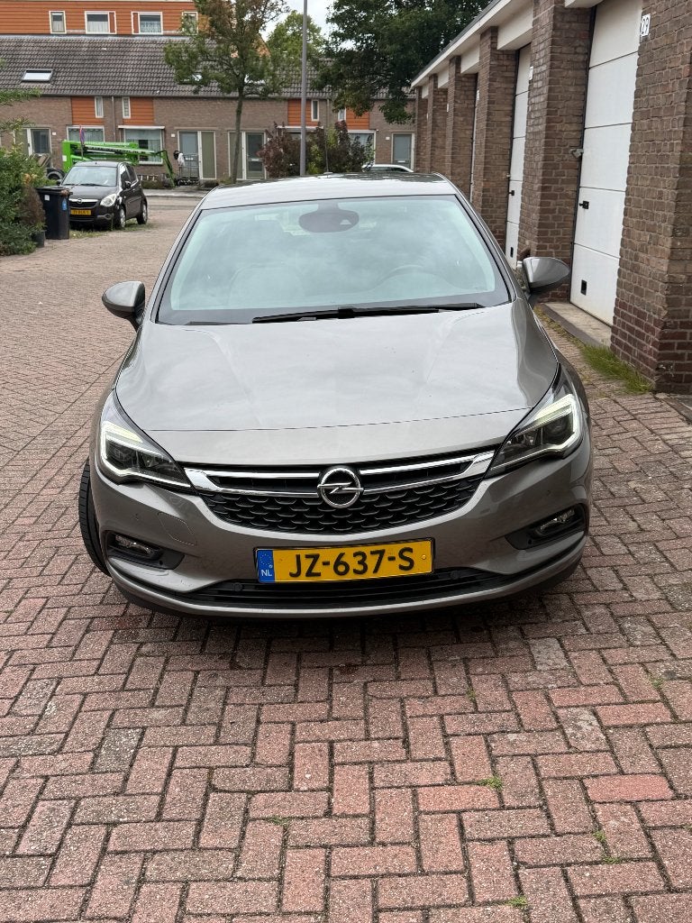 Opel Astra 1.0 Turbo automaat stuur en stoel verwarming, 4 cilinders, Bruin, 23 km/l, Origineel Nederlands