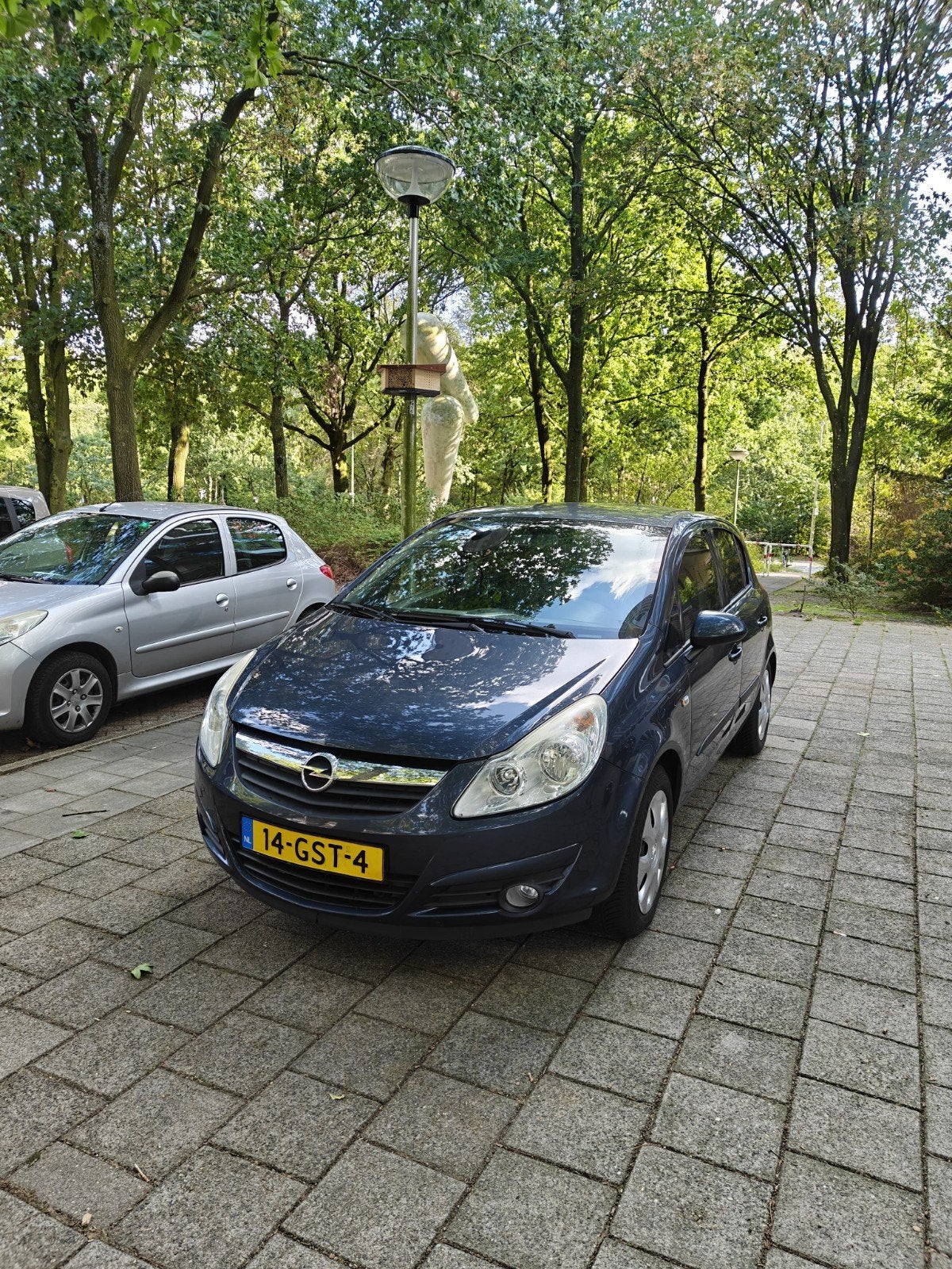 Opel Corsa 1.4 16V 5D 2008 Grijs, Voorwielaandrijving, Zwart, 4 cilinders, Blauw