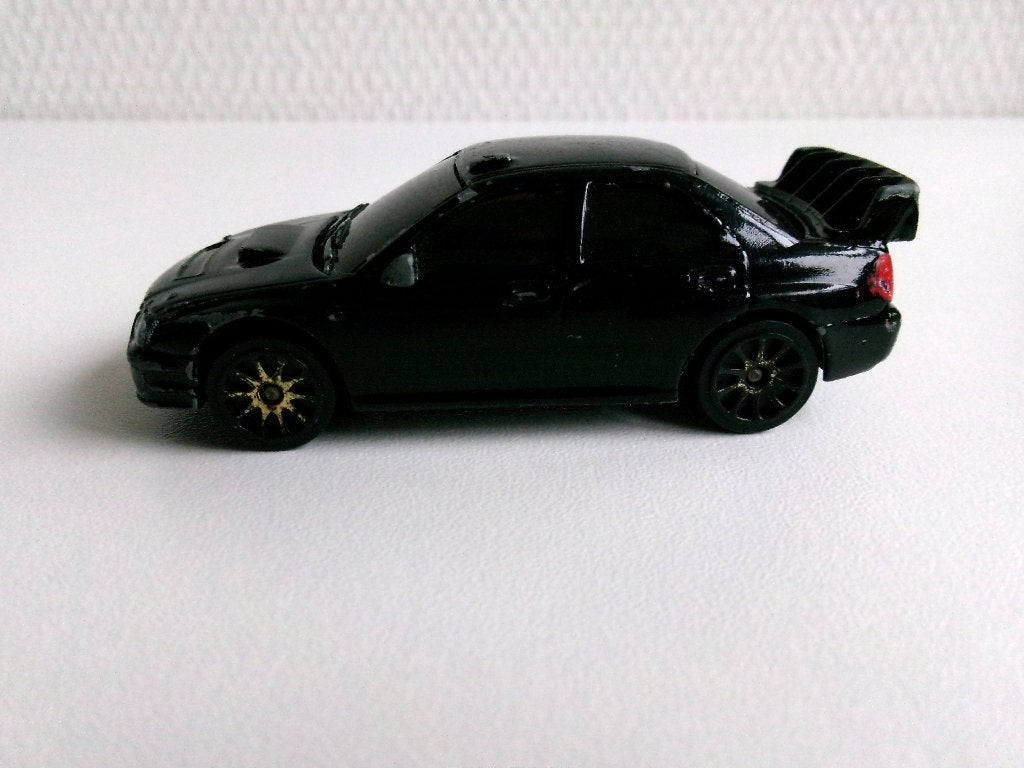 Subaru Impreza WRC zwart 1:57 Majorette (geen ovp), Ophalen of Verzenden, Gebruikt, Auto