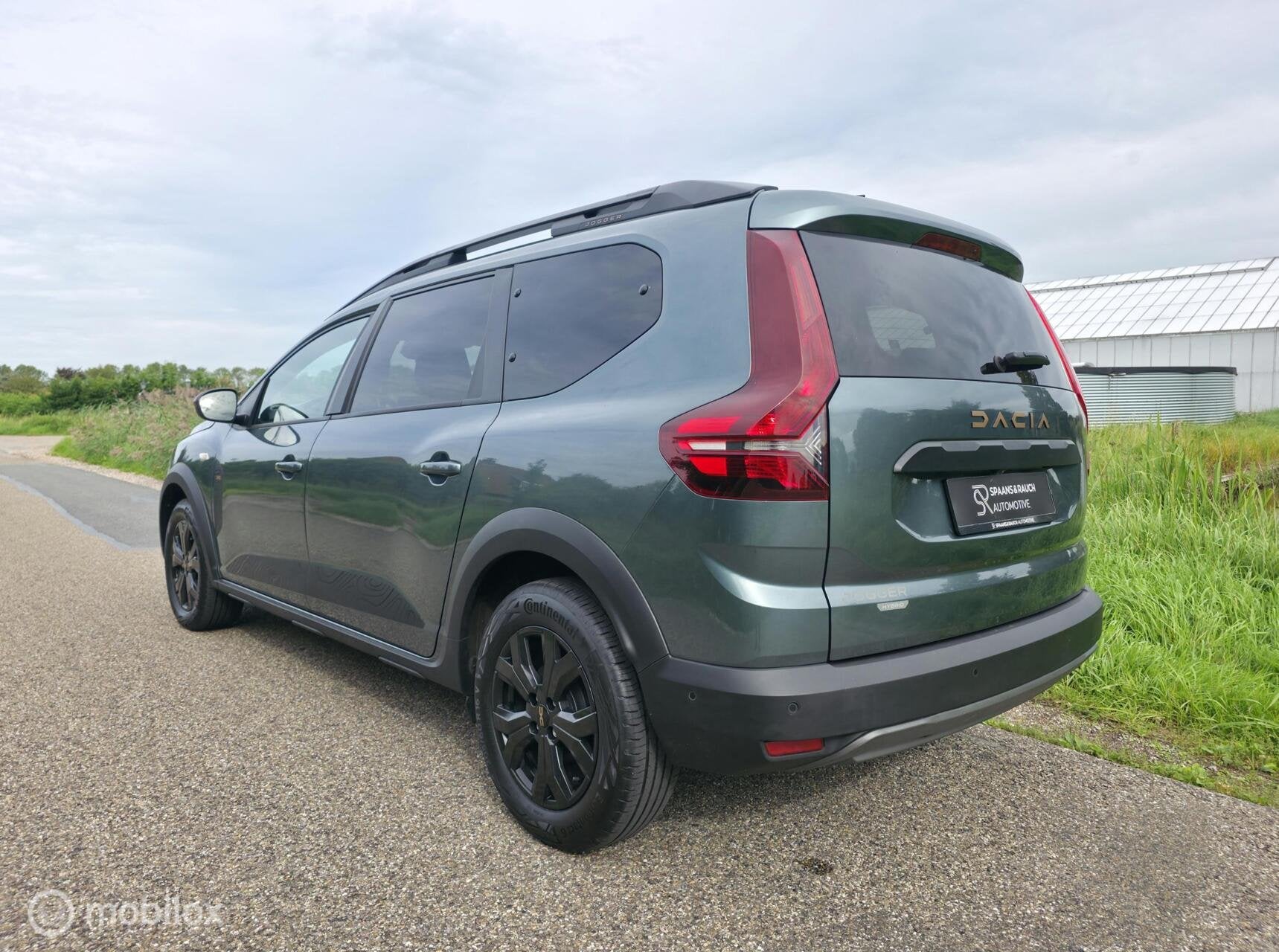 Dacia Jogger 1.6 Hybrid 140 Extreme 7p / Carplay / Camera, Auto's, Gebruikt, 4 cilinders, Grijs, Hybride Elektrisch/Benzine