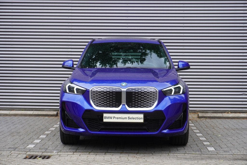 BMW iX1 eDrive20 M Sportpakket | Premium Pack | Trekhaak met, Auto's, BMW, 514 km, Met garantie (alle), Blauw, 204 pk
