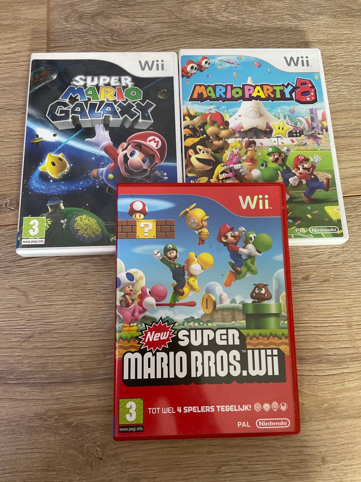 Wii bundel: Super Mario Galaxy (sealed), Mario Party 8, New, Eén computer, Ophalen of Verzenden, Zo goed als nieuw, Platform