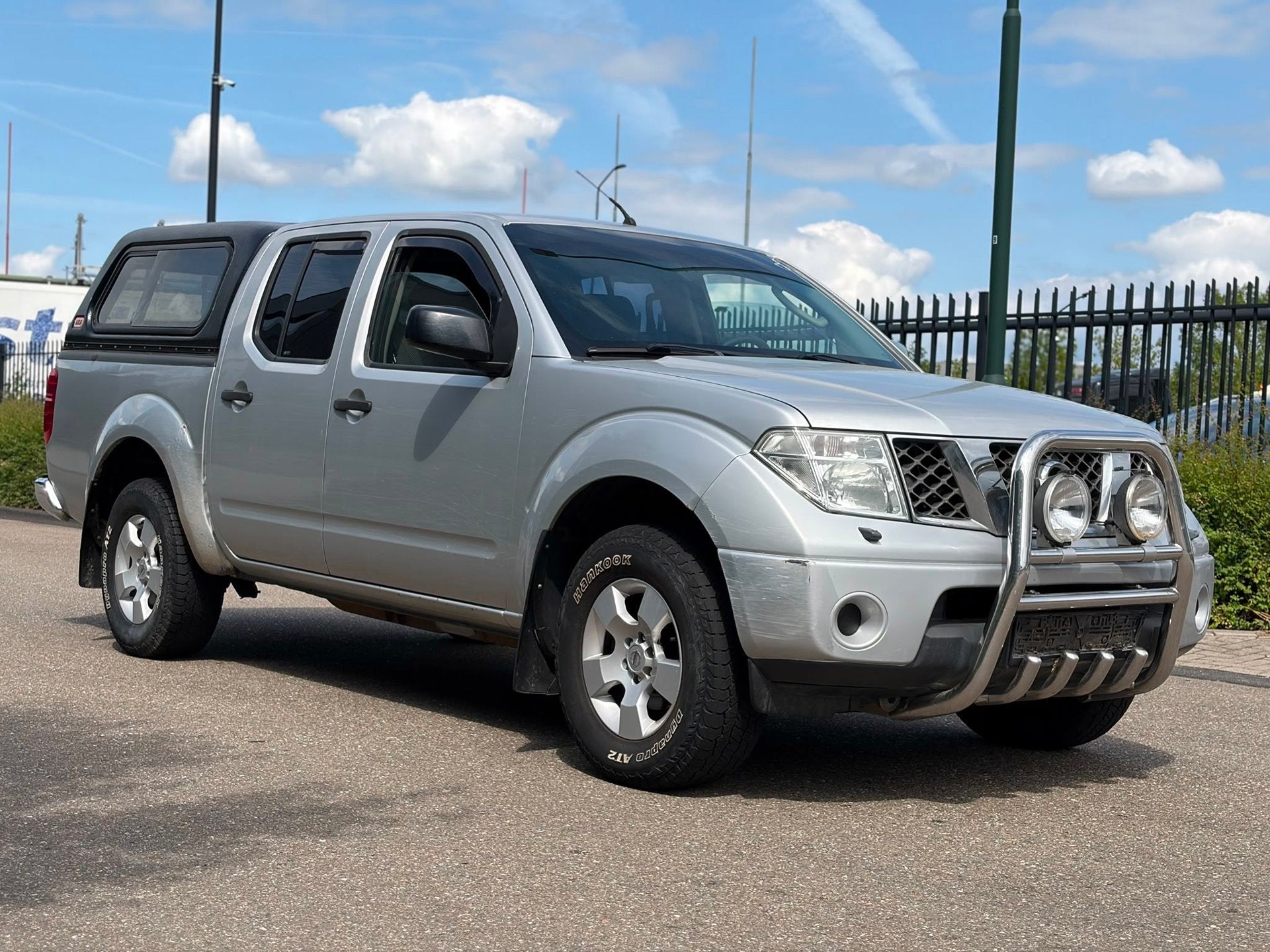 Nissan Navara 2.5 dCi SE Double Cab Export, Stof, Gebruikt, Origineel Nederlands, Bedrijf
