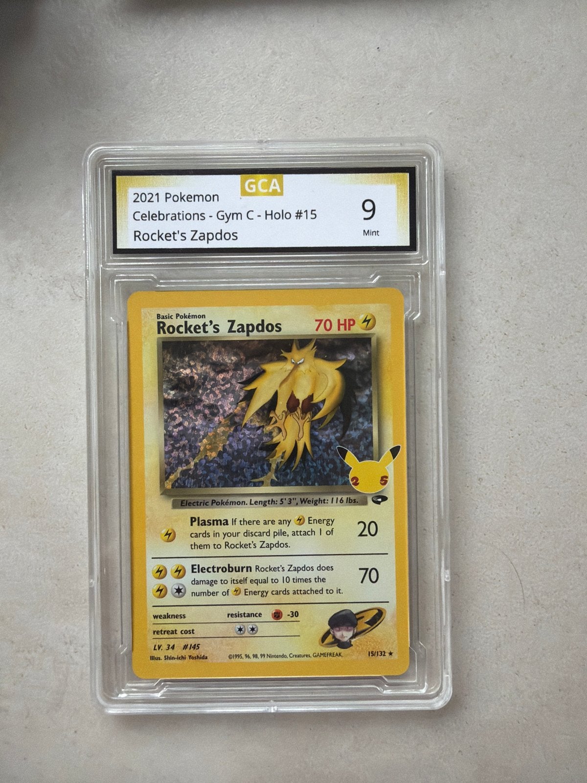 Rocket's Zapdos GCA 9 Mint - 2021 Pokemon Celebrations, Ophalen of Verzenden, Zo goed als nieuw, Losse kaart, Foil