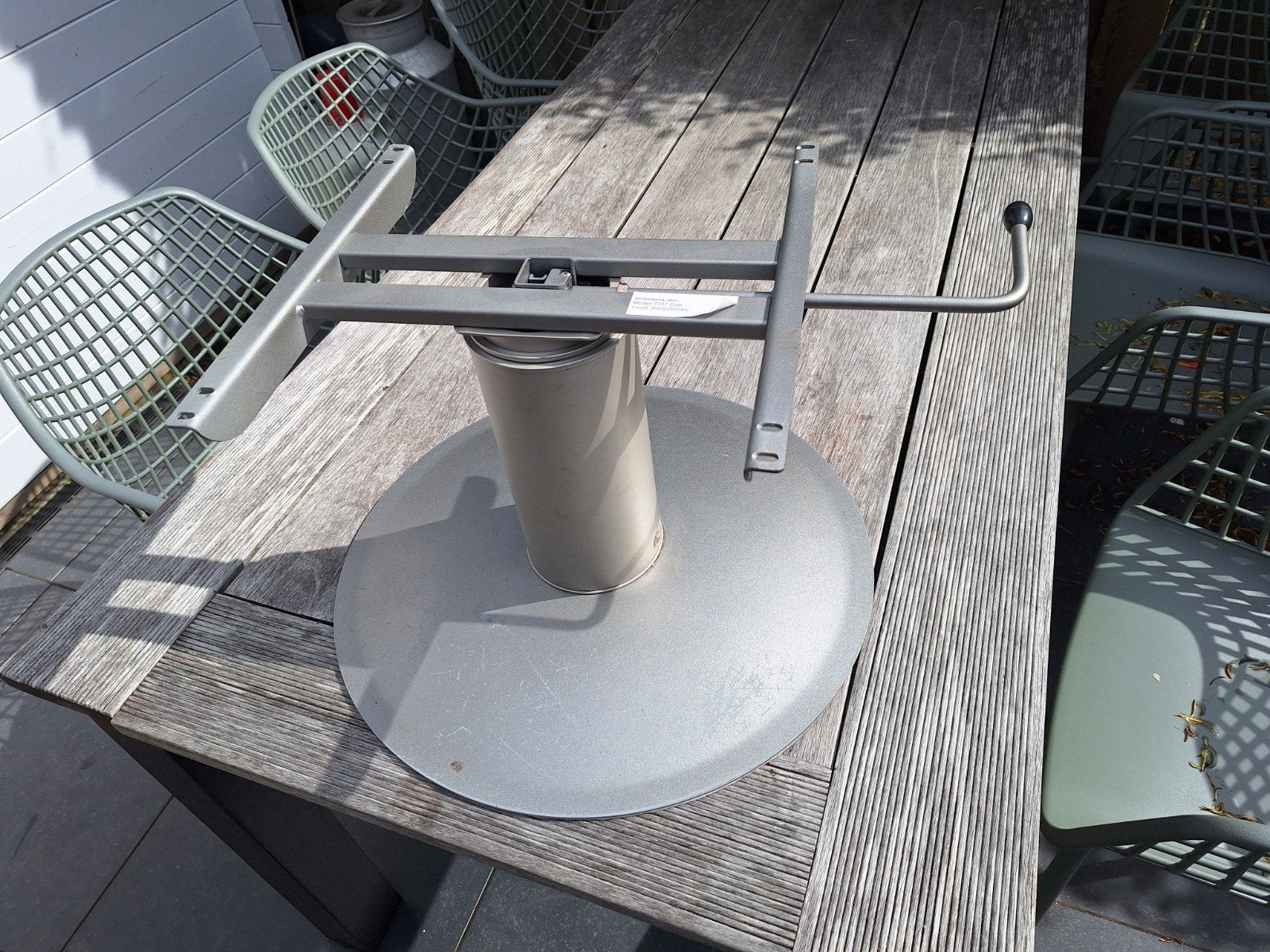 Telescoop tafelpoot, Ophalen