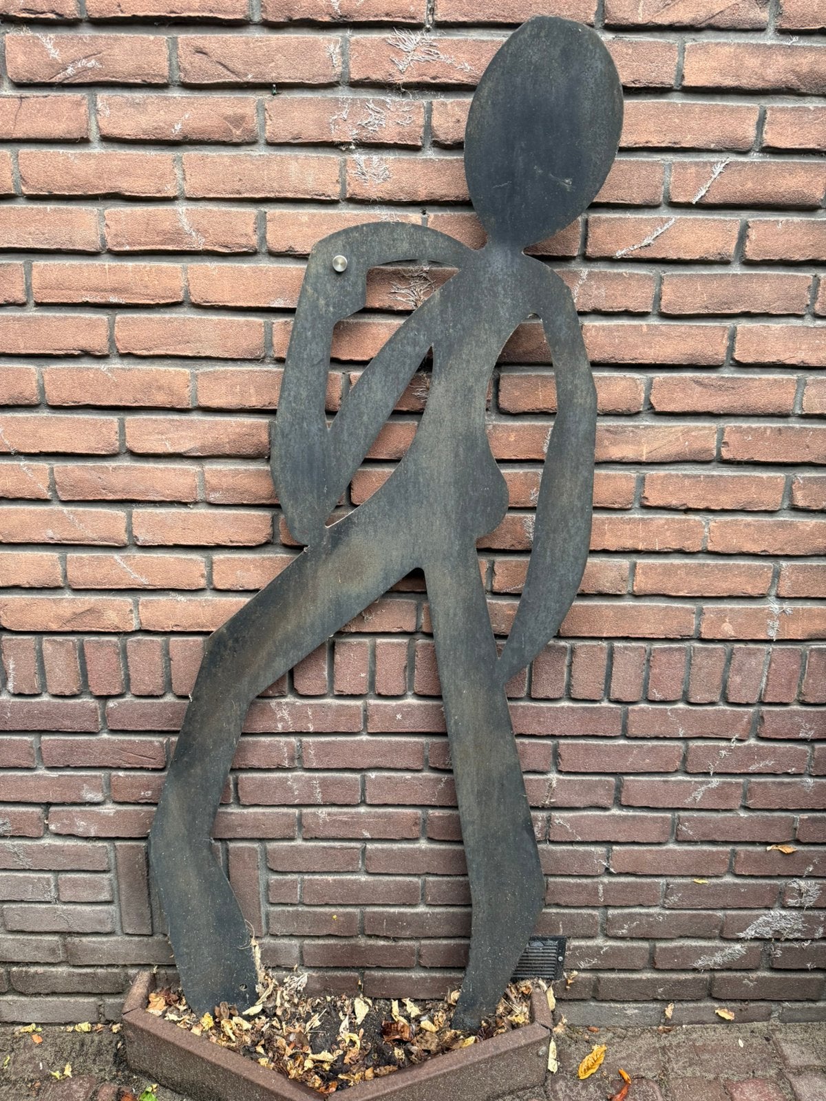 Twee paspop figuren etalage buitenstandaard, Ophalen