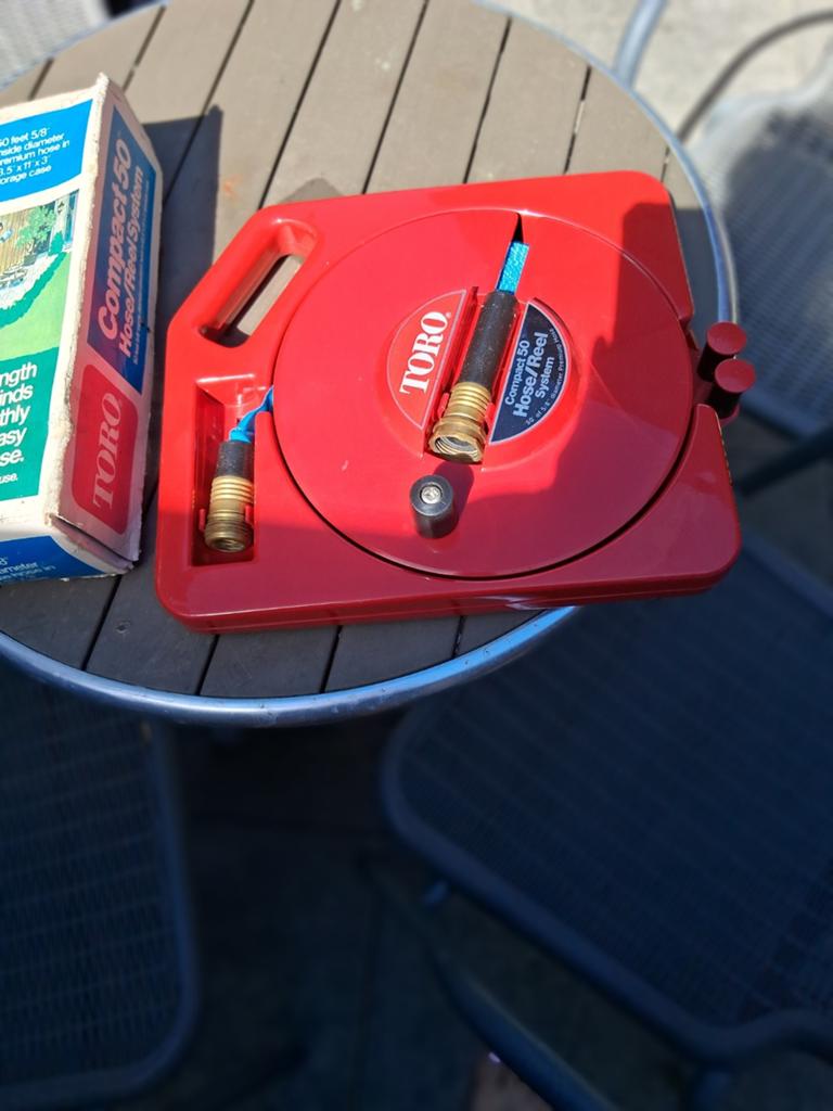 Toro Compact 50 Tuinslanghaspel met slang, Tuin en Terras, Tuinslangen, Ophalen of Verzenden, Gebruikt, Tuinslanghaspel