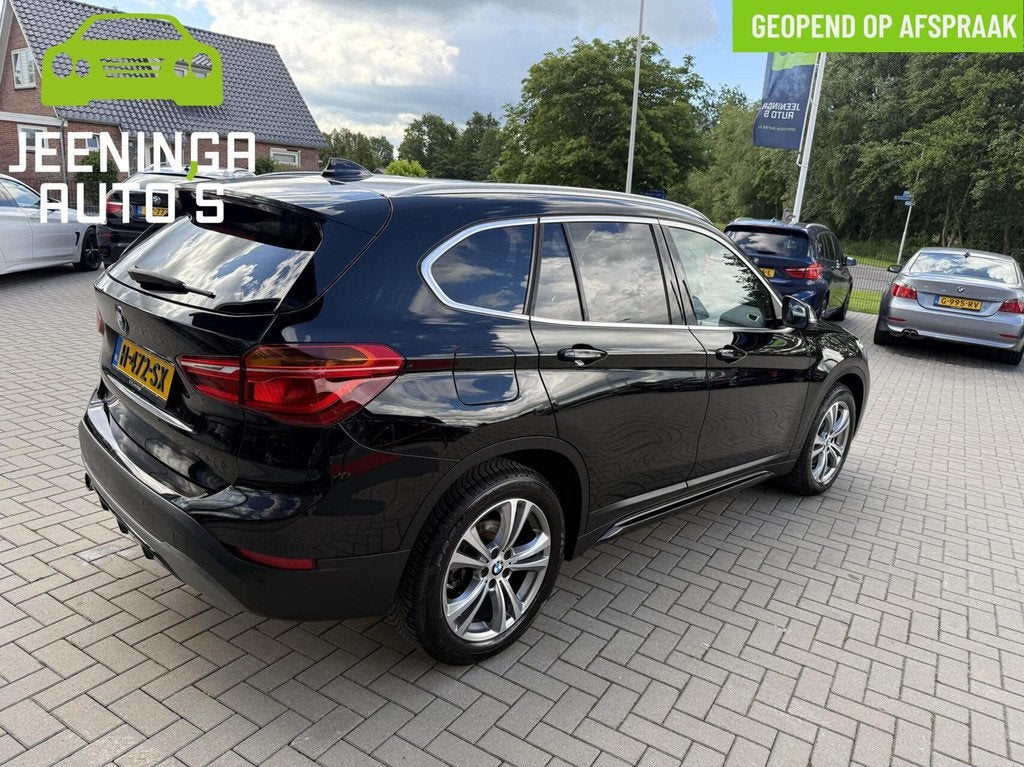 BMW X1 sDrive18i Centennial High Executive|Stoelverwarming|N, 136 pk, Gebruikt, Zwart, Leder
