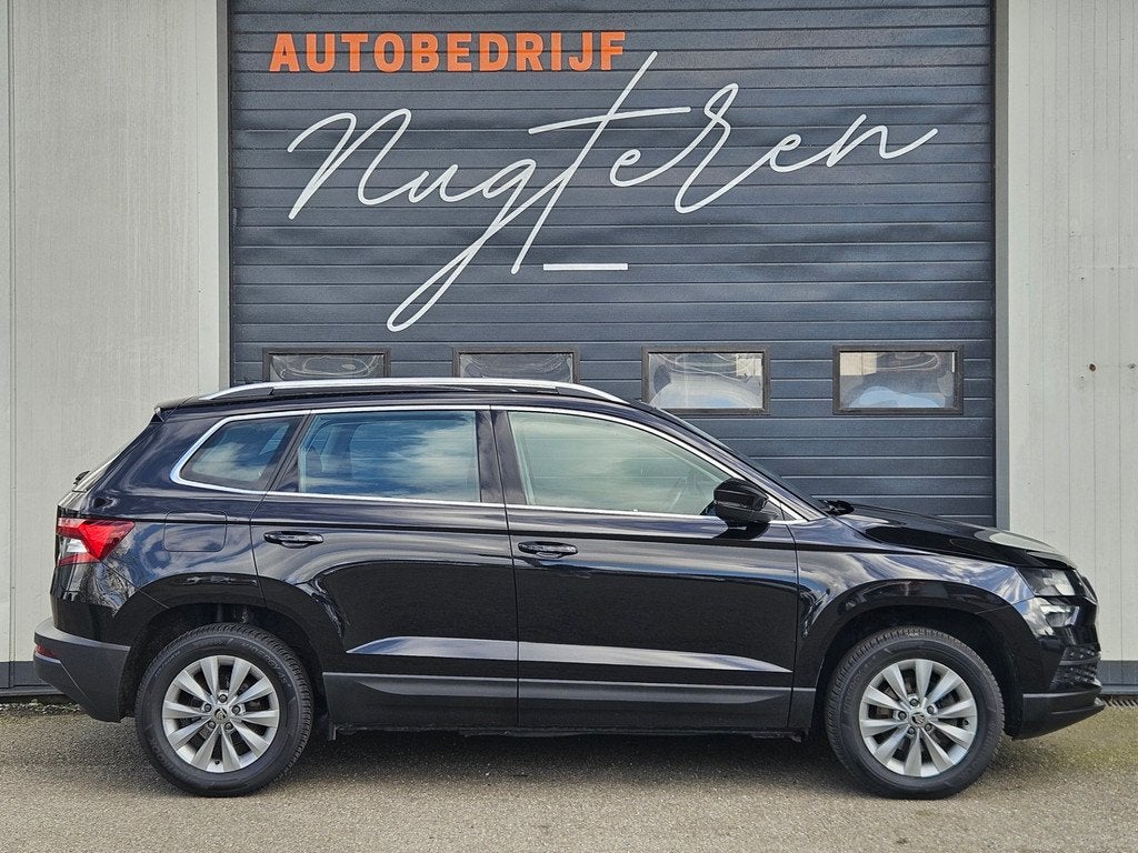 Skoda Karoq 1.0 TSI Style |Camera|Cruise|Clima|Stoelverwarmi, Voorwielaandrijving, Stof, Gebruikt, 116 pk