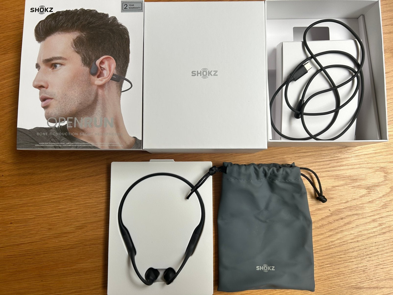 SHOKZ OpenRun bone conduction hoofdtelefoon zwart, Bone conduction, Ophalen of Verzenden, Zo goed als nieuw, Draadloos