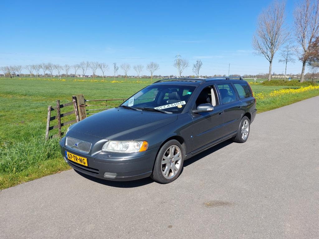 Volvo V70 2.4 D5 136KW Geartronic 2007 Grijs, Auto's, 1800 kg, Xenon verlichting, Diesel, Zilver of Grijs