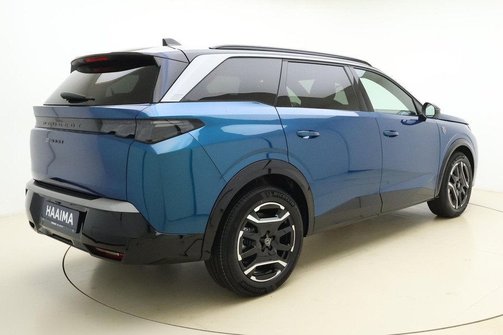Peugeot e-5008 GT Avantage 73 kWh 7p 100% | Bekleding Alcant, Auto's, Peugeot, 213 pk, Lichtsensor, Blauw, 7 stoelen