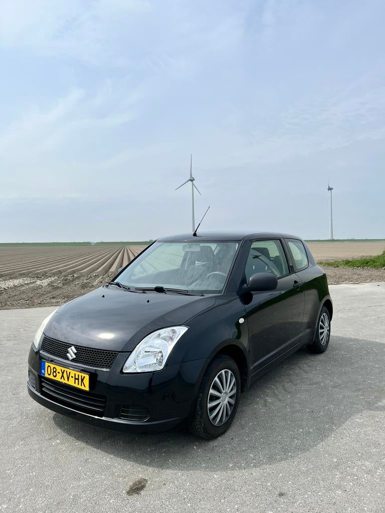 Suzuki Swift 1.3 3D 2007 Zwart, Stof, LED verlichting, Origineel Nederlands, Handgeschakeld