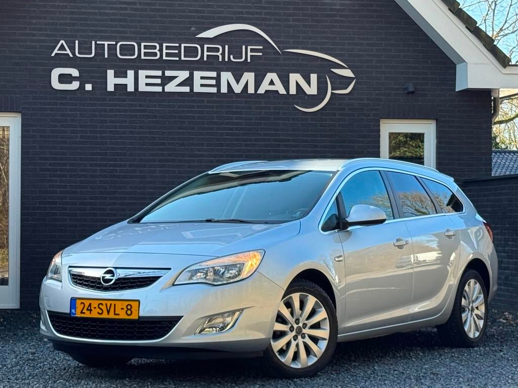 Opel Astra Sports Tourer 1.4 Turbo Cosmo Navigatie Cruise Co, Voorwielaandrijving, Euro 5, Gebruikt, Zwart