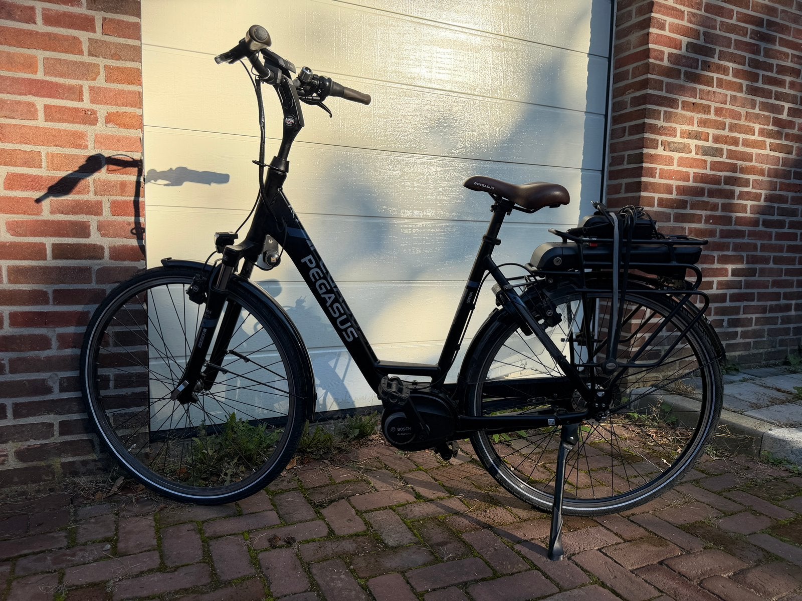 Pegasus Bosch middenmotor elektrische fiets, Zo goed als nieuw, 51 tot 55 cm, 50 km per accu of meer, Ophalen