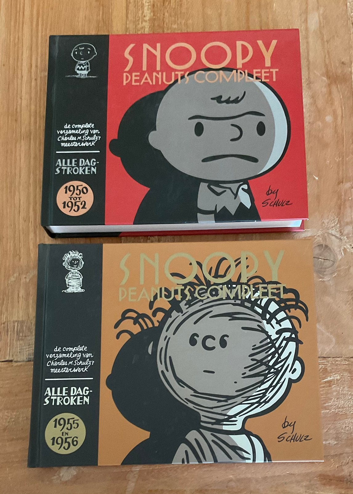2 x Snoopy peanuts compleet 1950 tot 1952 en  1955 tot 1956, Boeken, Meerdere stripboeken, Ophalen of Verzenden, Zo goed als nieuw