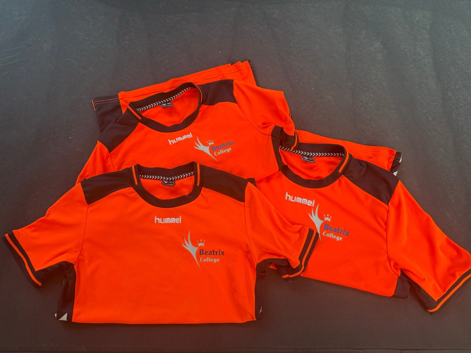 3x Hummel sportshirt Beatrix College, Ophalen of Verzenden, Gedragen, Maat 46 (S) of kleiner, Oranje
