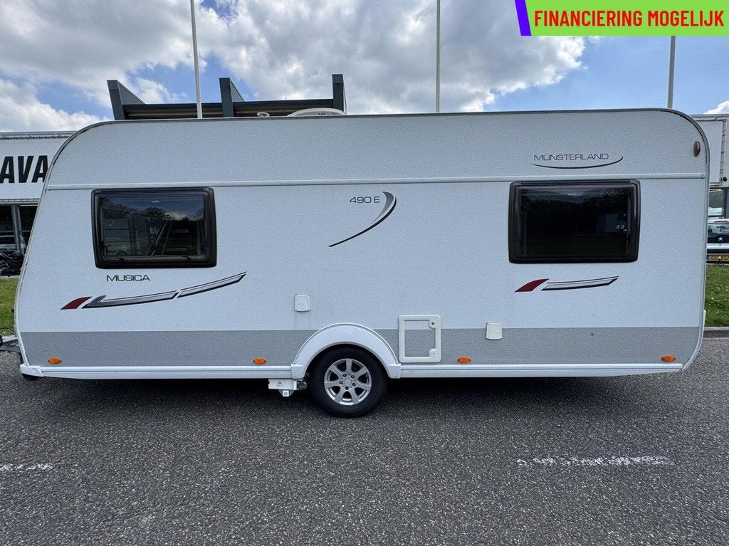 LMC MUNSTERLAND MUSICA 490 E MOVER + LUIFEL + SCHOTEL + TV, Caravans en Kamperen, Caravans, Rondzit, 7 tot 8 meter, Bedrijf, Hordeur