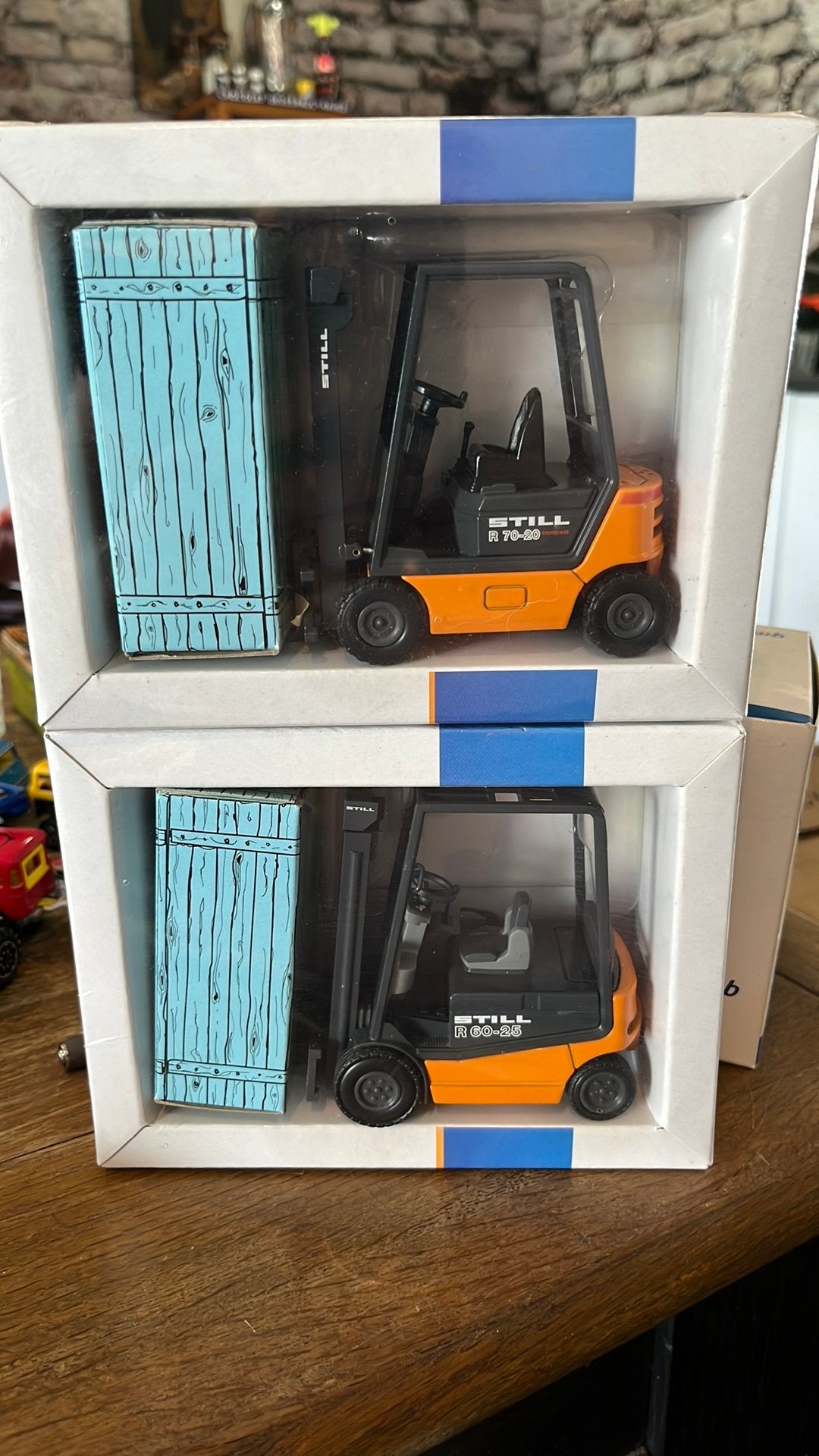 Twee Still heftruck 1/25 NZG R70-20 & R60-25 nieuw, Ophalen of Verzenden, Nieuw, NZG