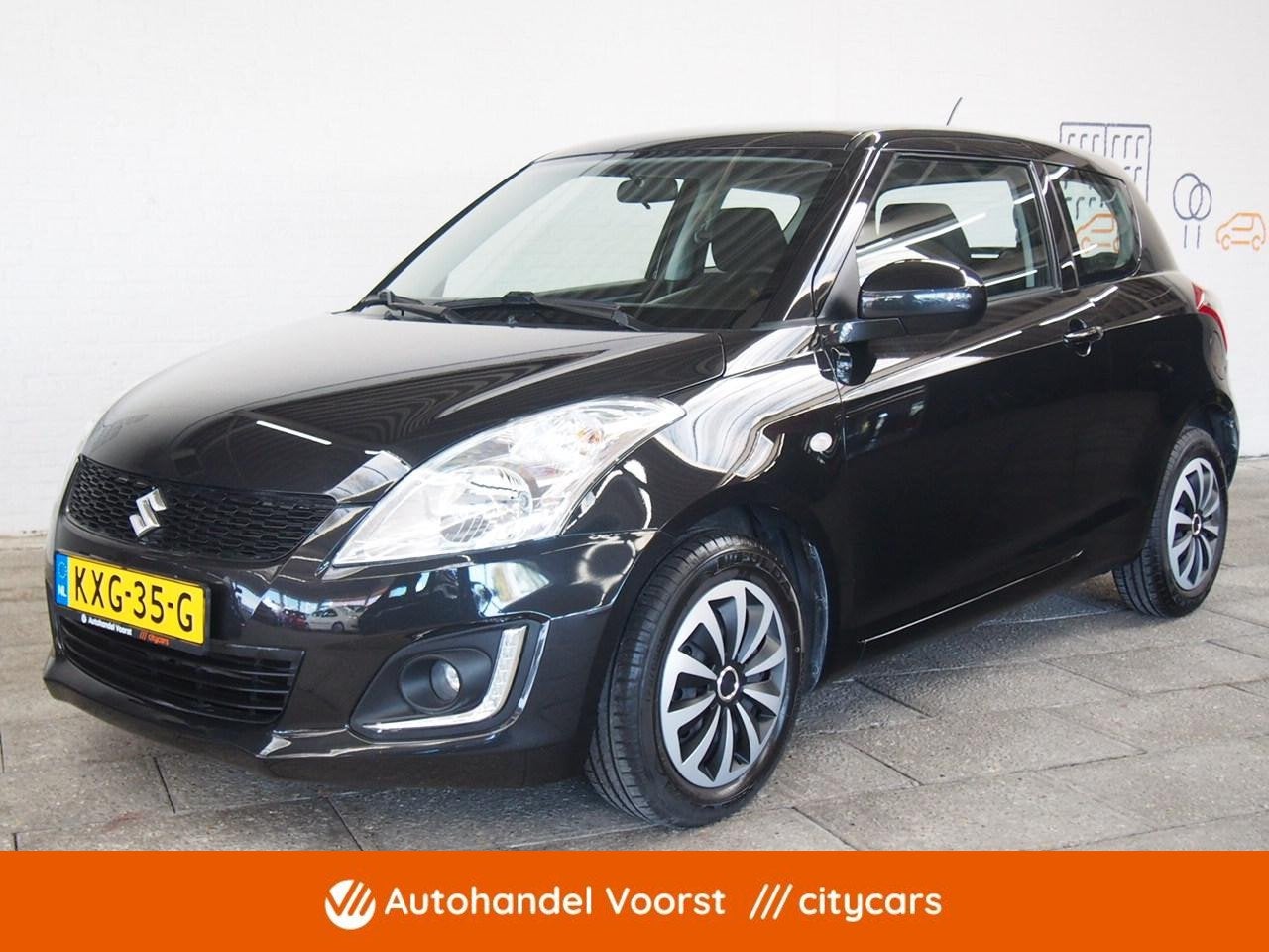 Suzuki Swift 1.2 Exclusive EASSS Cruise (APK:Nieuw) Incl.Gar, Auto's, Voorwielaandrijving, Stof, Gebruikt, Met garantie (alle)