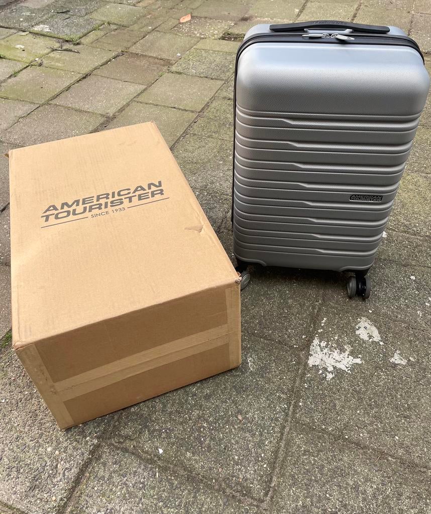 American tourister mooie grijs koffer & factuur evt garantie, Sieraden, Tassen en Uiterlijk, Koffers, Wieltjes, 50 tot 60 cm, Hard kunststof