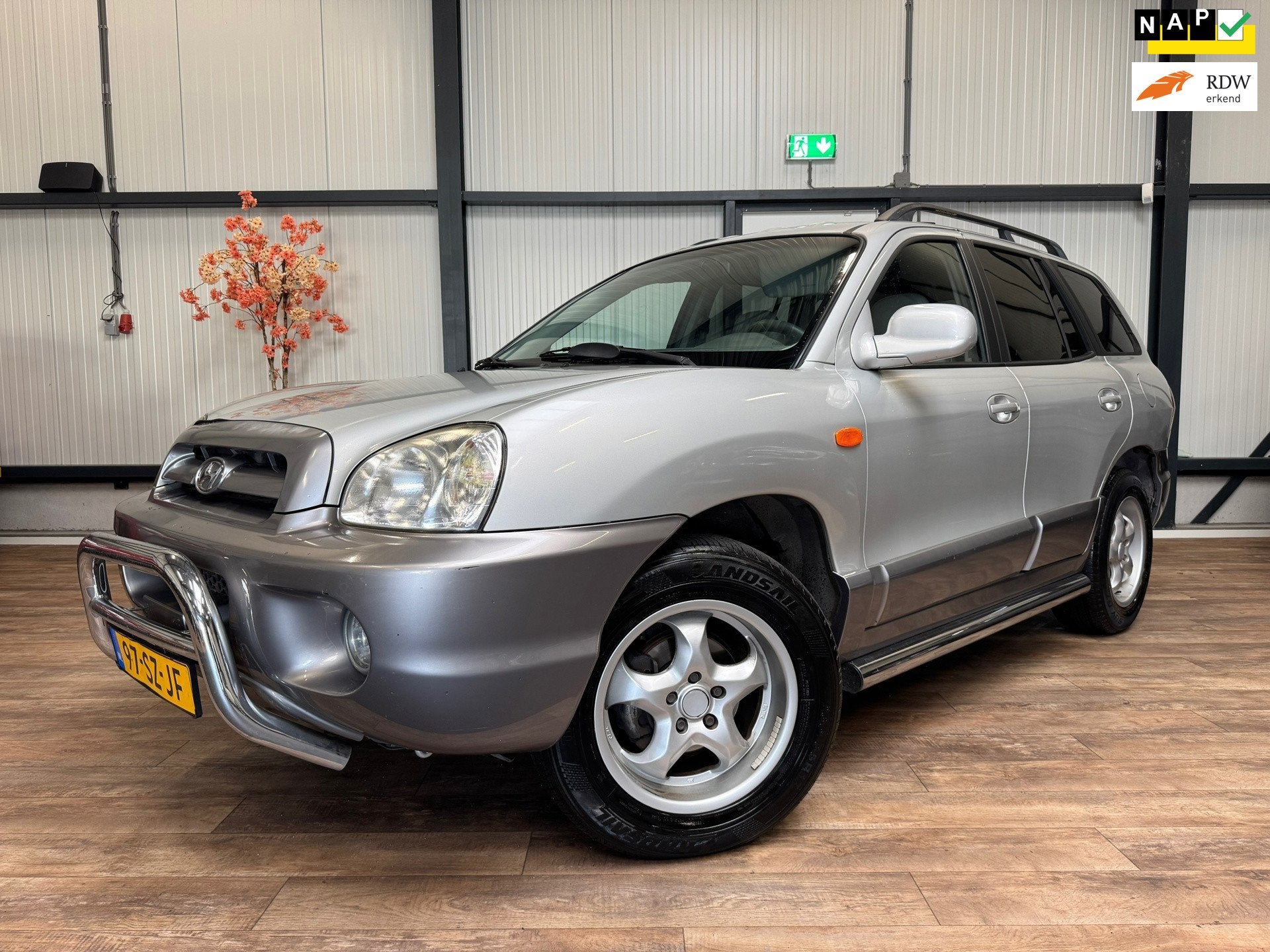 Hyundai Santa Fe 2.4i-16V Elite / CLIMA / LEDER / CRUISE /, Auto's, Voorwielaandrijving, Santa Fe, Gebruikt, 2000 kg
