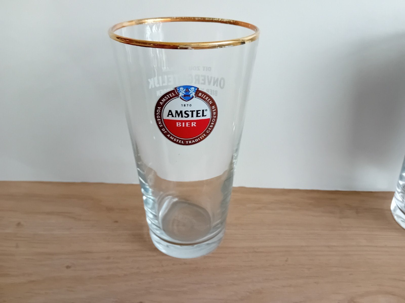 Amstel glas nummer 8 met achteropdruk, Verzamelen, Ophalen of Verzenden, Zo goed als nieuw, Glas of Glazen, Amstel
