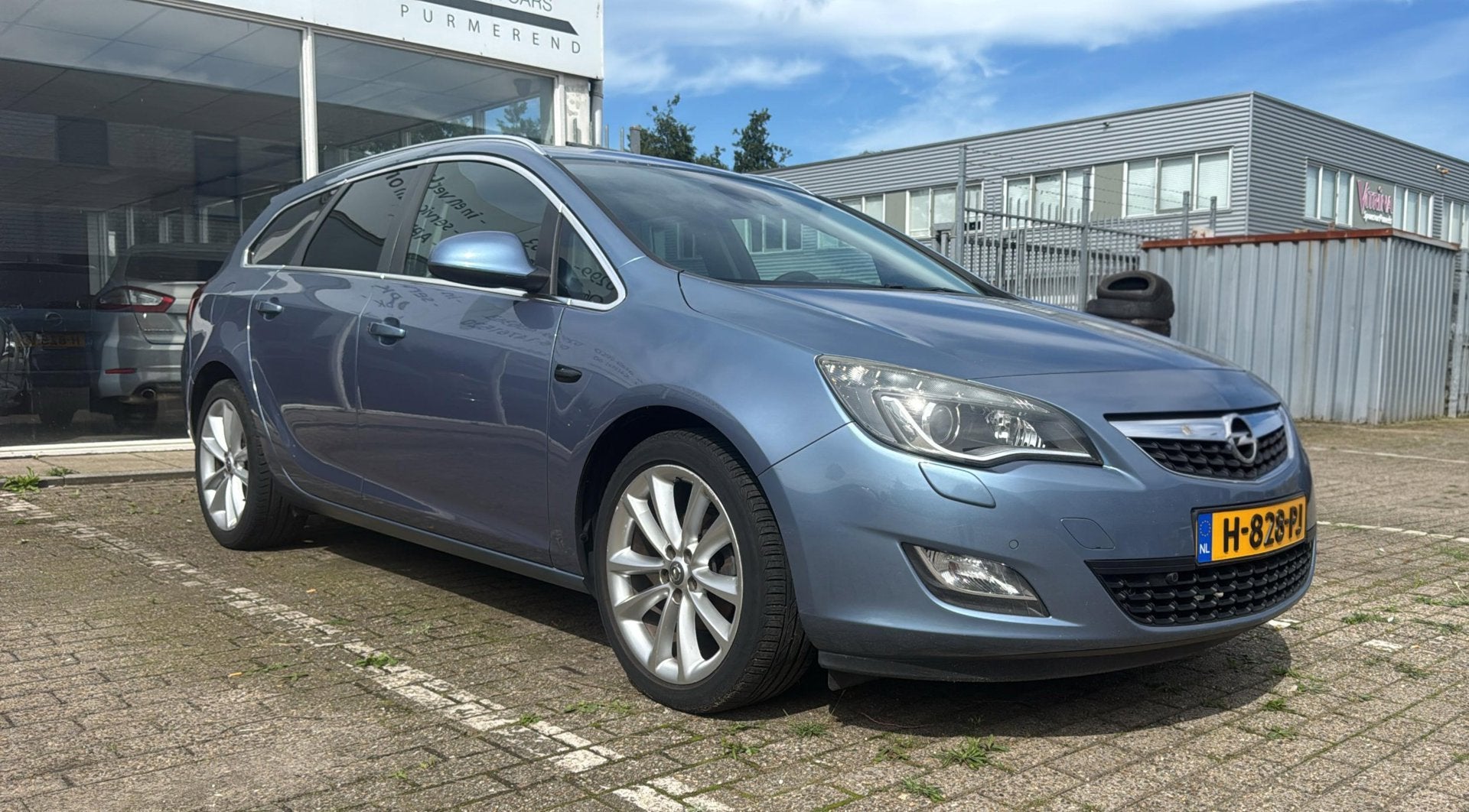 Opel Astra Sports Tourer 1.4 Turbo Sport, Voorwielaandrijving, Euro 5, Stof, Gebruikt
