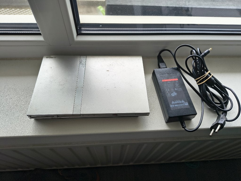 Playstation 2 Slim silver defect + kabels + memory card, Ophalen of Verzenden, Zonder controller, Niet werkend, Zilver