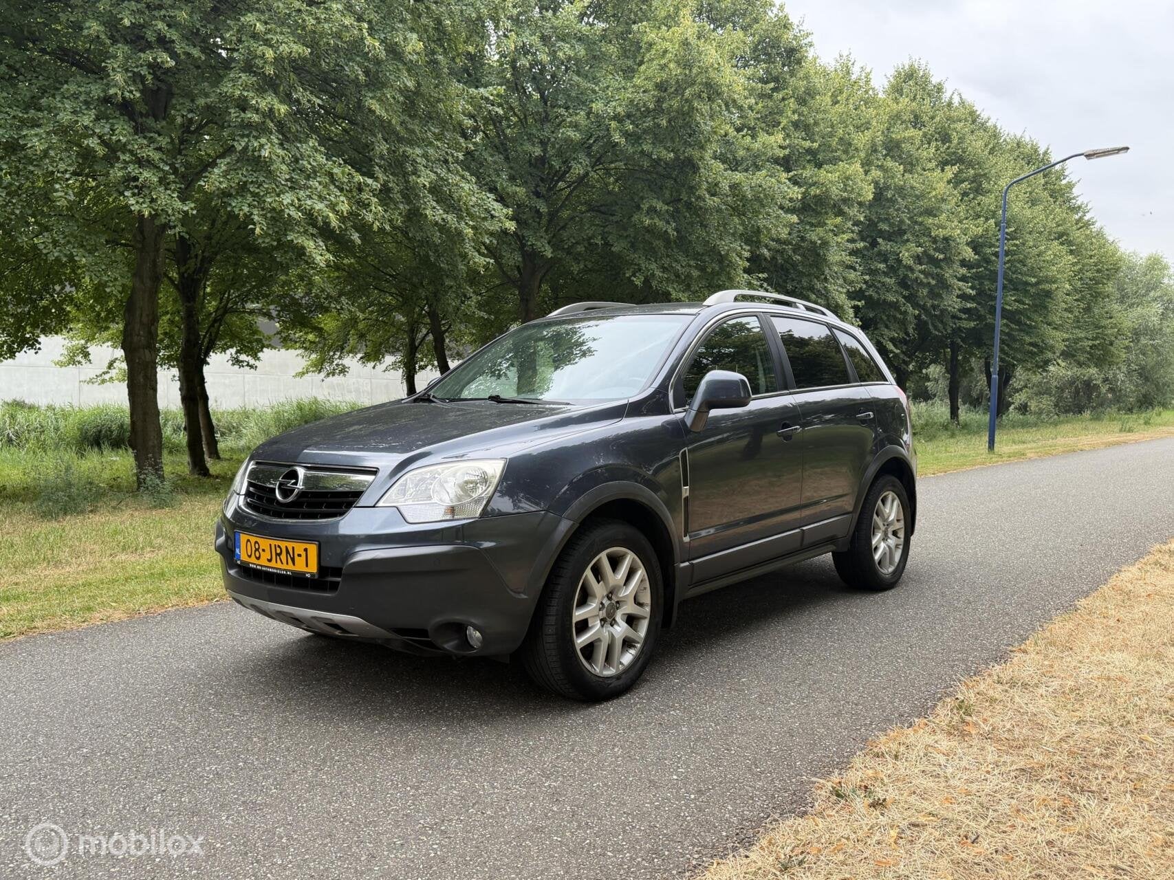 Opel Antara 2.4-16V Temptation*4WD*NAVI*TREKHAAK*CRUISE*AIRC, Auto's, Stof, Gebruikt, Zwart, 4 cilinders