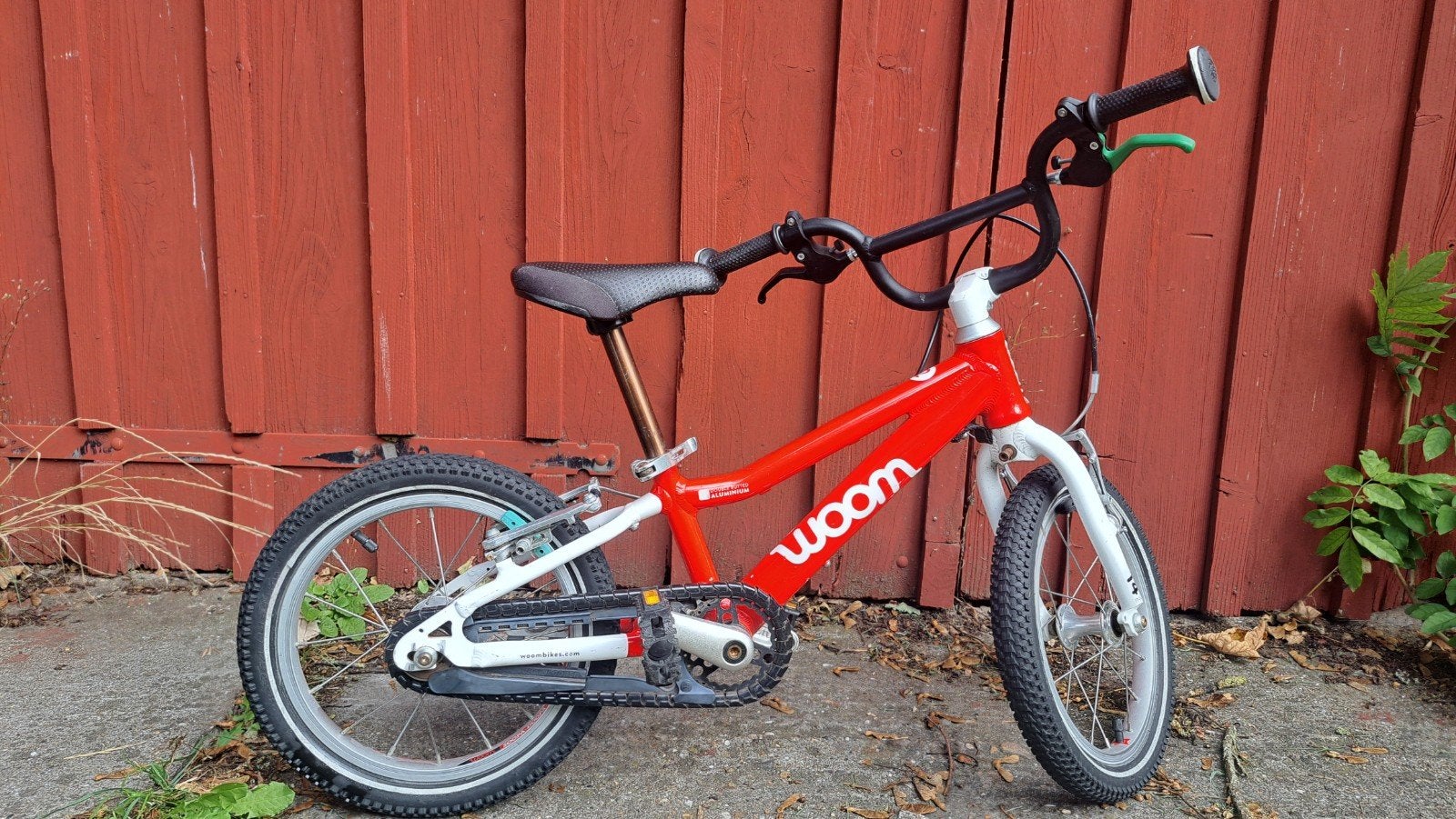 Woom 2 rood kinderfiets, Ophalen, Gebruikt, Velgrem, Minder dan 16 inch
