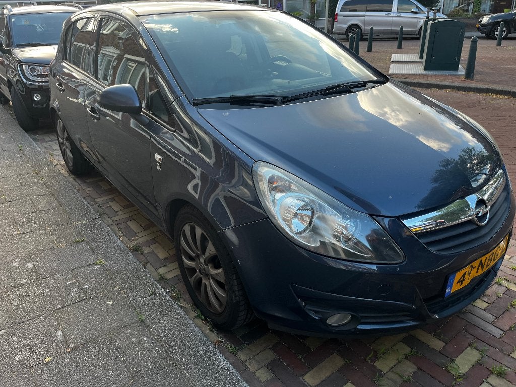 Opel Corsa 1.2 16V 5D Easytronic 2010 Blauw AUTOMAAT, Auto's, Stof, 4 cilinders, Blauw, 1229 cc