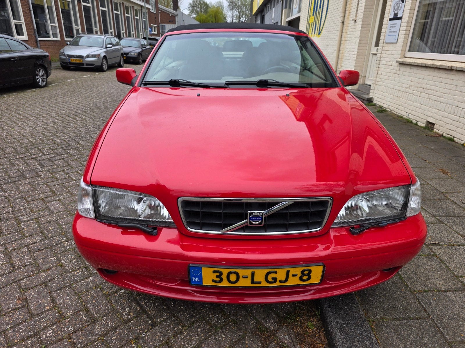 Volvo C70 2.3 T5 2004 Rood Rica 310PK, Auto's, C70, Cabriolet, 4 stoelen, Stoelverwarming
