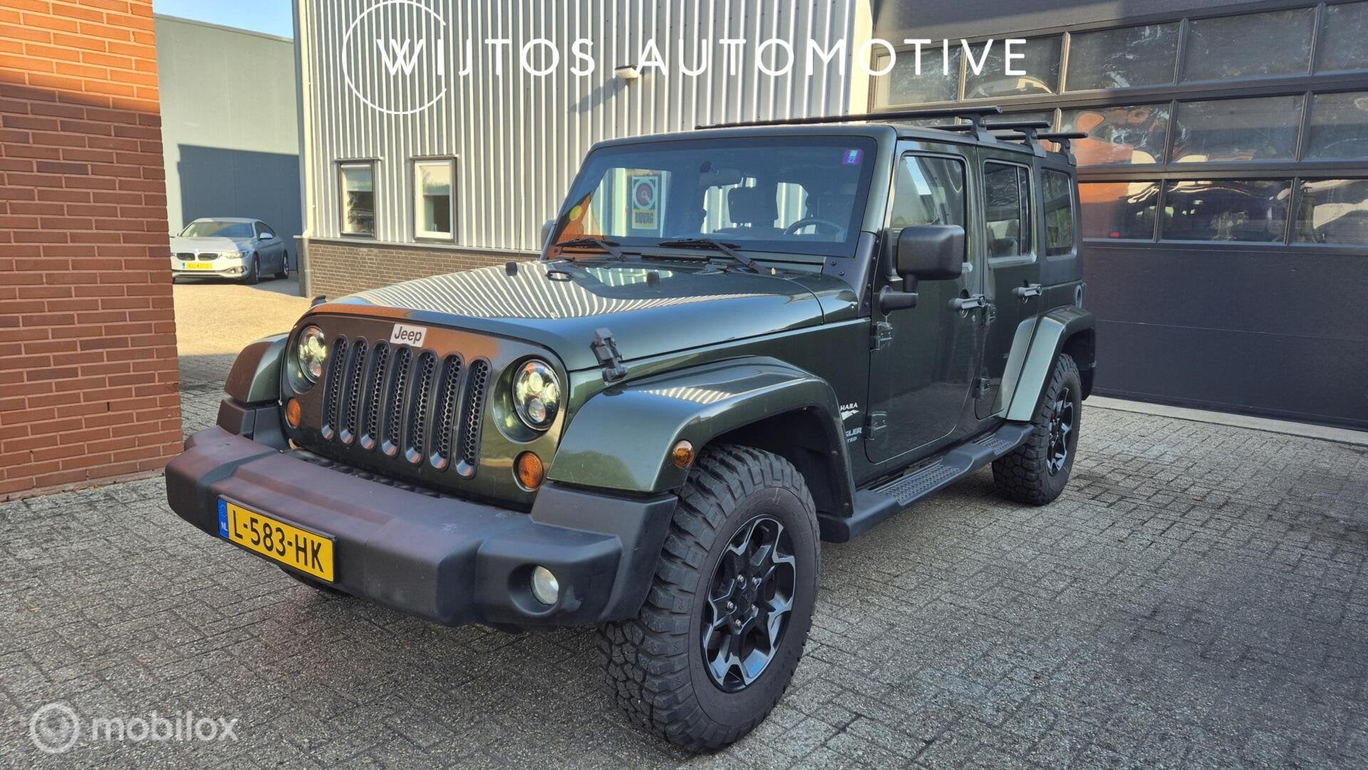 Jeep Wrangler Unlimited 3.8 Sahara, Auto's, Jeep, Stof, Gebruikt, 120 €/maand, Bedrijf