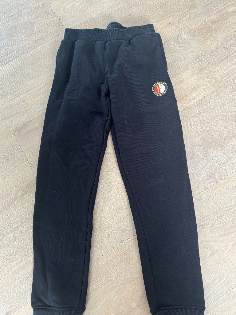 Feyenoord joggingbroek mt158 nieuw ., Zwart, Overige maten, Ophalen of Verzenden, Zo goed als nieuw