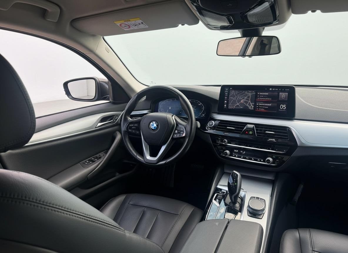 Foto 10 van BMW 5-serie Touring 520i High Executive