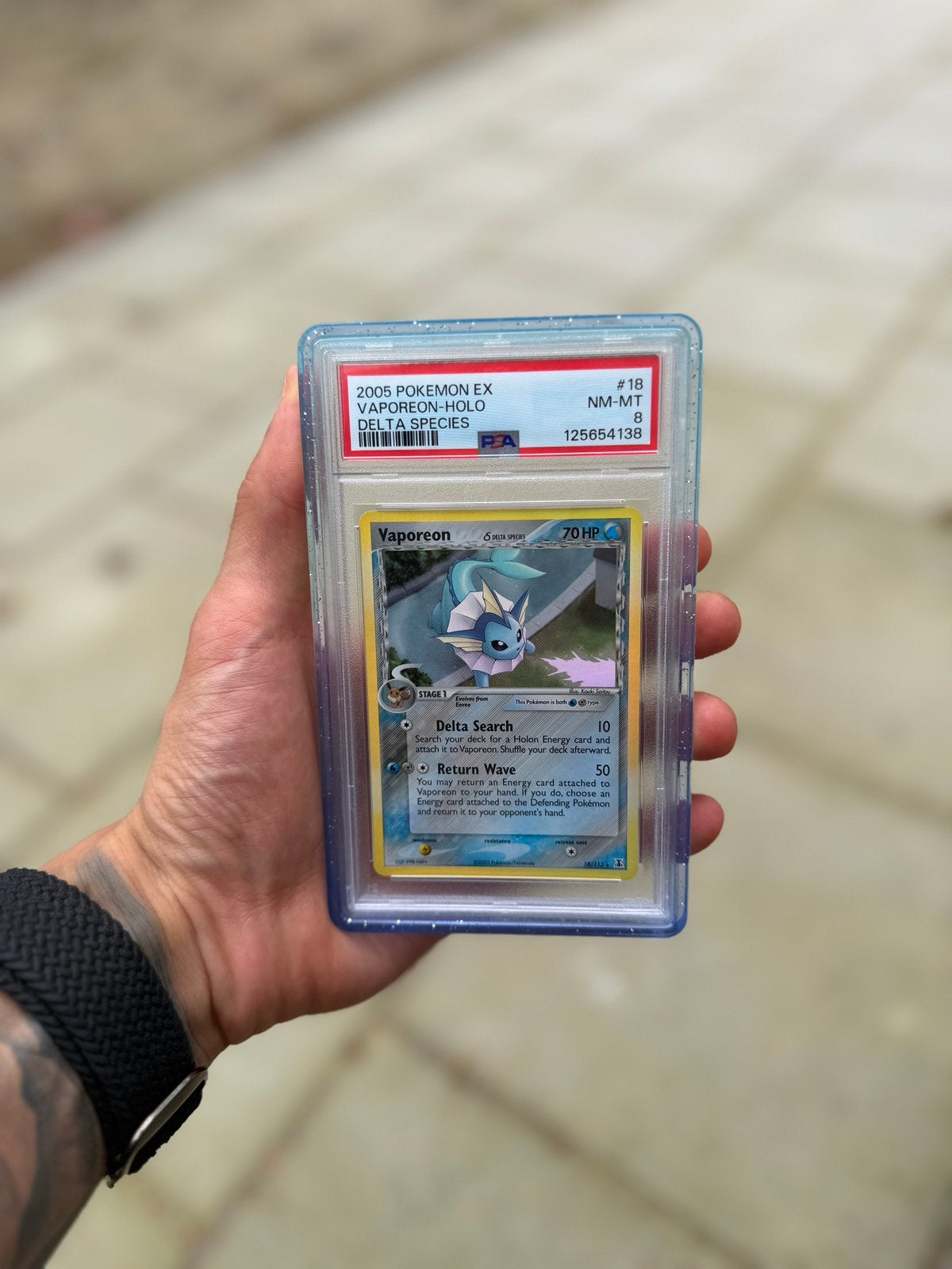 PSA 8 Vaporeon Holo #18 EX Delta Species, Ophalen of Verzenden, Zo goed als nieuw