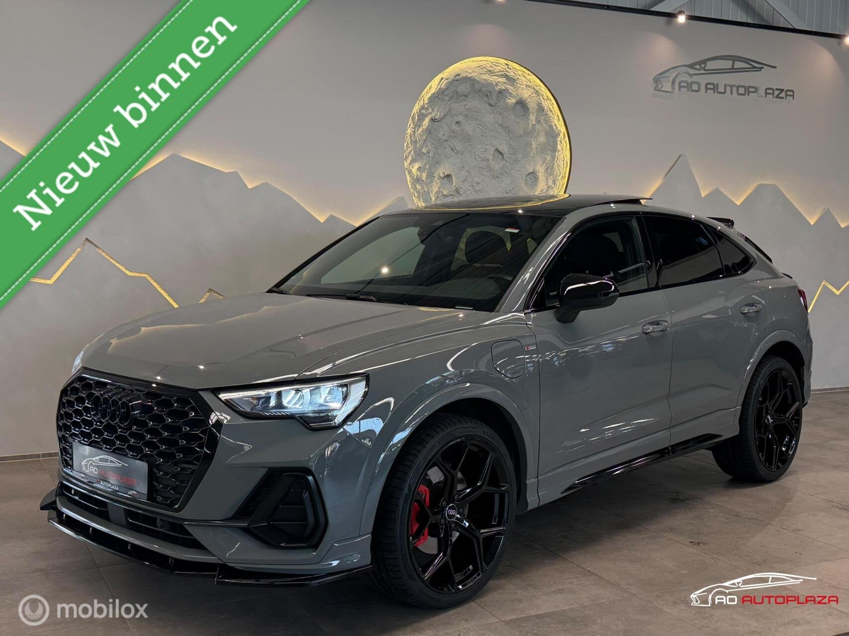 Audi Q3 Sportback 45 TFSI e S-line Panorama/B&O/RS Q3 look, Auto's, Dealer onderhouden, Zwart, Leder en Stof, Verwarmde buitenspiegels
