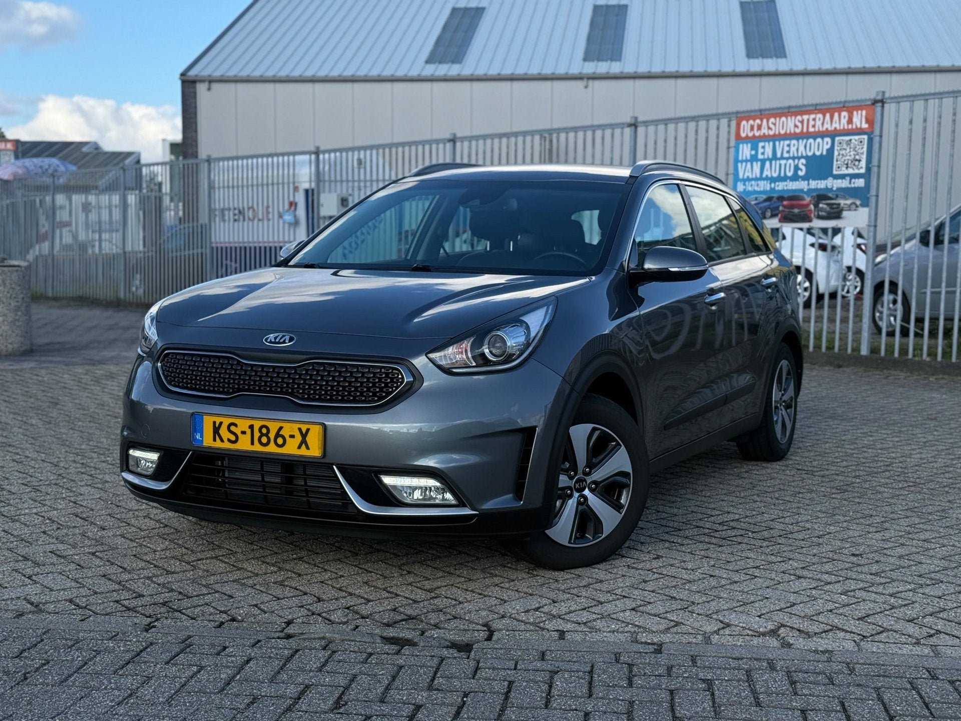 Kia Niro 1.6 GDi Hybrid First Edition#Nap#Aut#Trekhk, Auto's, Gebruikt, 26 km/l, SUV of Terreinwagen, Zilver of Grijs