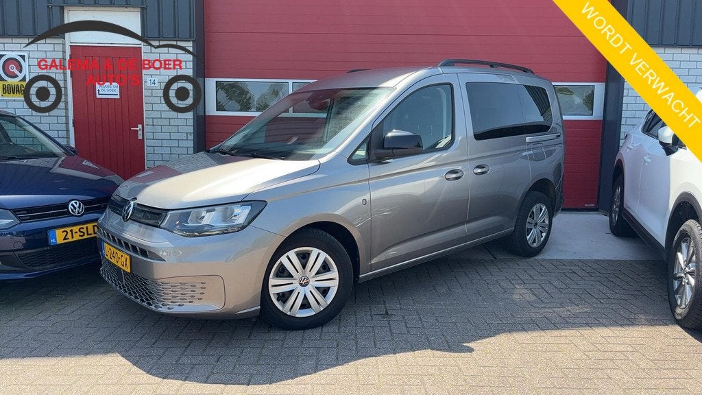 Volkswagen Caddy 1.5 TSI 5p AUTOMAAT / NAVI / AIRCO / PDC /, Auto's, Stof, 4 cilinders, Geel, Bedrijf