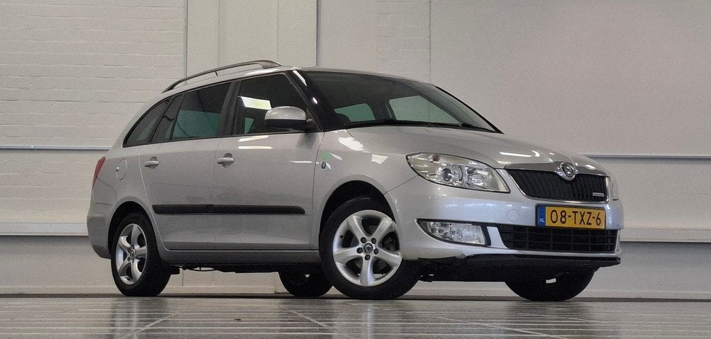 Skoda Fabia Combi 1.2 TDI Businessline Lerenbekleding Navi P, Voorwielaandrijving, Euro 5, Zwart, 1199 cc