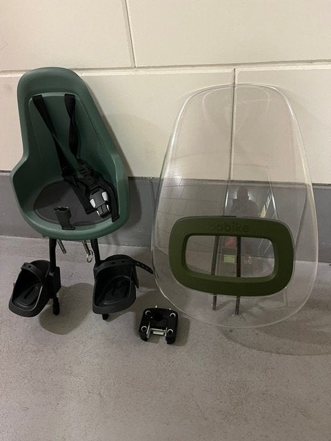 Te koop nieuw kinderzitje fiets voorop., Fietsen en Brommers, Fietsaccessoires | Fietsstoeltjes, Voetsteuntjes, Voorzitje, Nieuw