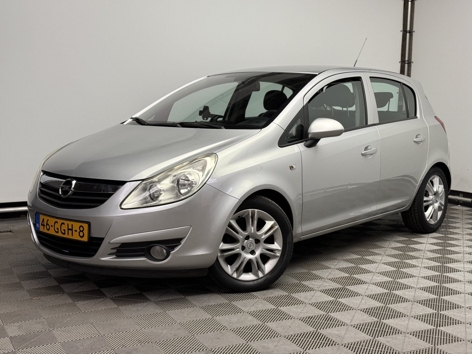 Opel Corsa 1.4-16V Enjoy 5-drs Airco LM16" NL Auto, Auto's, Voorwielaandrijving, Gebruikt, 4 cilinders, Met garantie (alle)