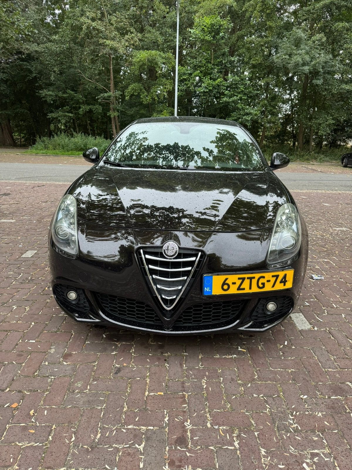 Alfa Romeo Giulietta 1.750 TBI 2011 Zwart APK tot17-07-2027, 4 cilinders, Leder en Stof, Zwart, Handgeschakeld