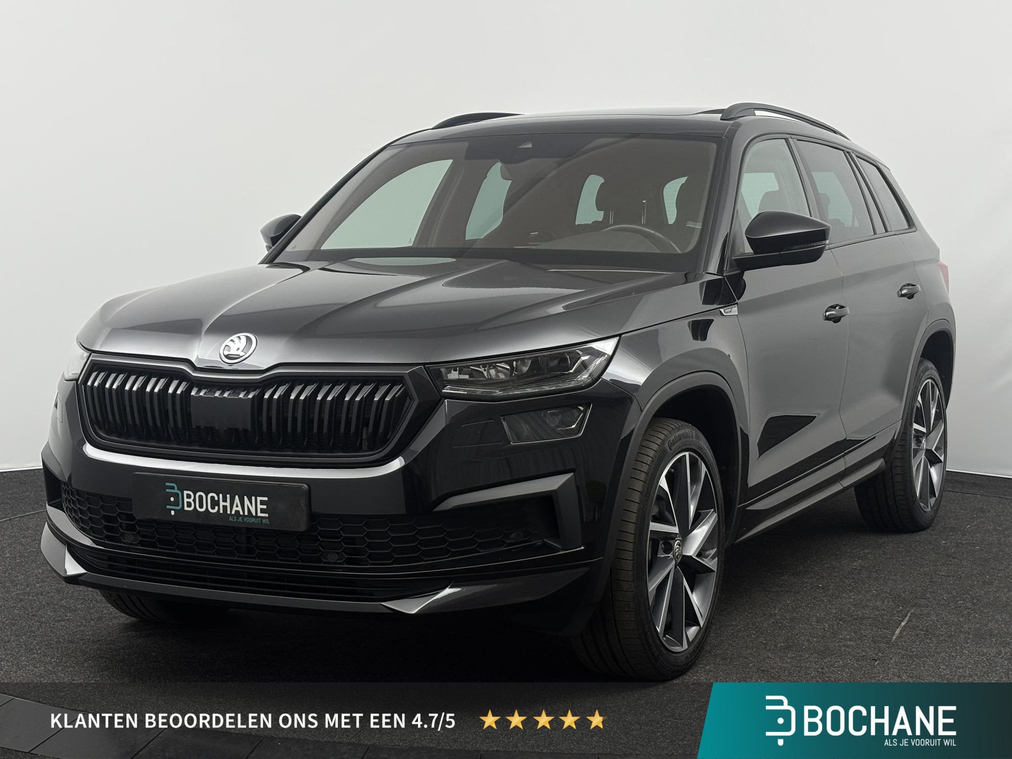 Skoda Kodiaq 1.5 TSI 150pk DSG Sportline Business 7p. | NL A, Auto's, 4 cilinders, 7 stoelen, Zwart, Bedrijf