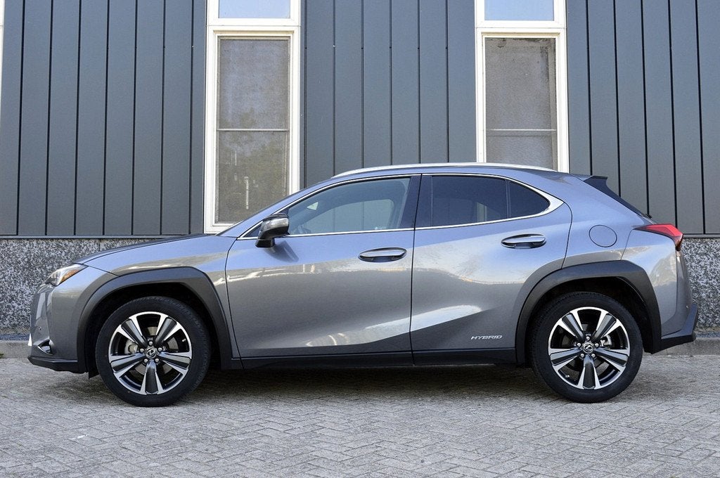 Lexus UX 250h Preference Line Rijklaarprijs-Garantie Apple/A, Auto's, Lexus, 12 maanden, 4 cilinders, Alcantara, Bedrijf