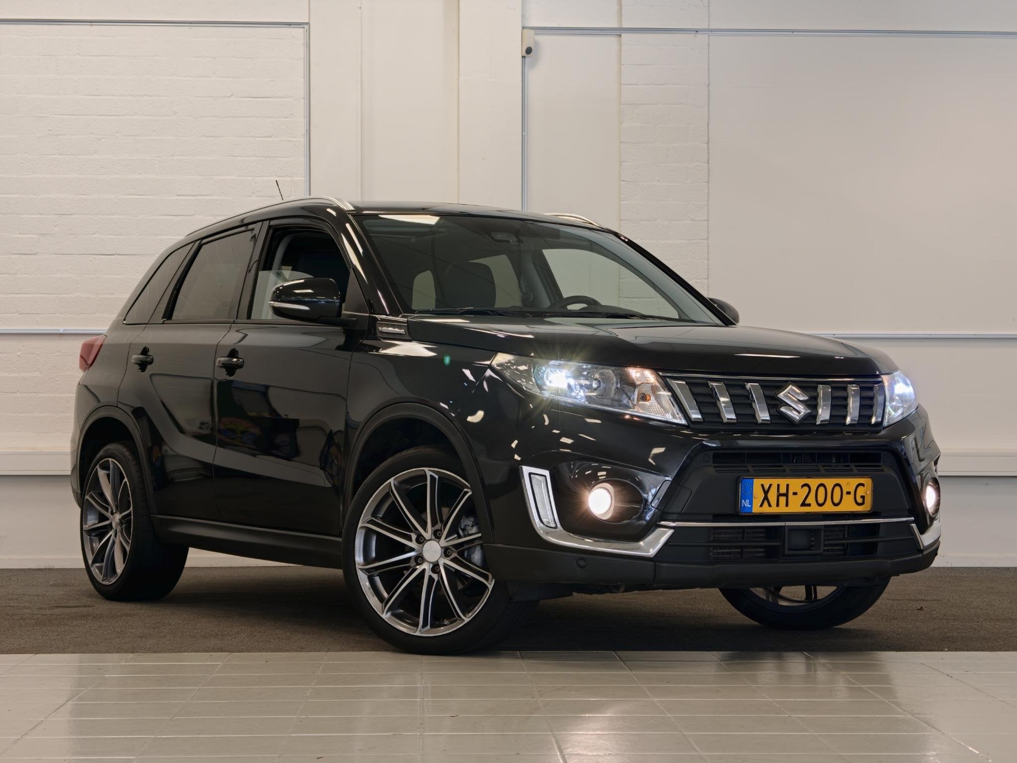 Suzuki Vitara 1.4 Boosterjet AllGrip Stijl Camera Navi Carpl, Auto's, Gebruikt, Euro 6, 400 kg, Origineel Nederlands